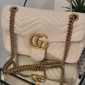 100% Authentic Gucci bag. It great condition. Has small scratch on inside flap.